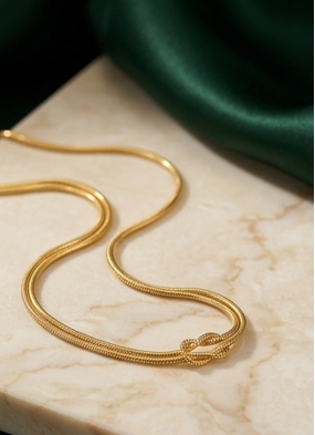 Collana "Legame" con Nodo Centrale e Doppia Catena Snake